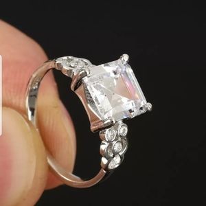 HUGE white 4.76k emerald  cut sapphire silver ring